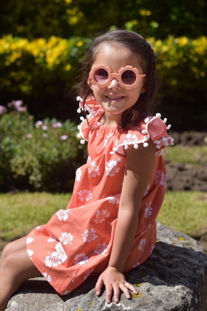 Close up of girl in orange dress